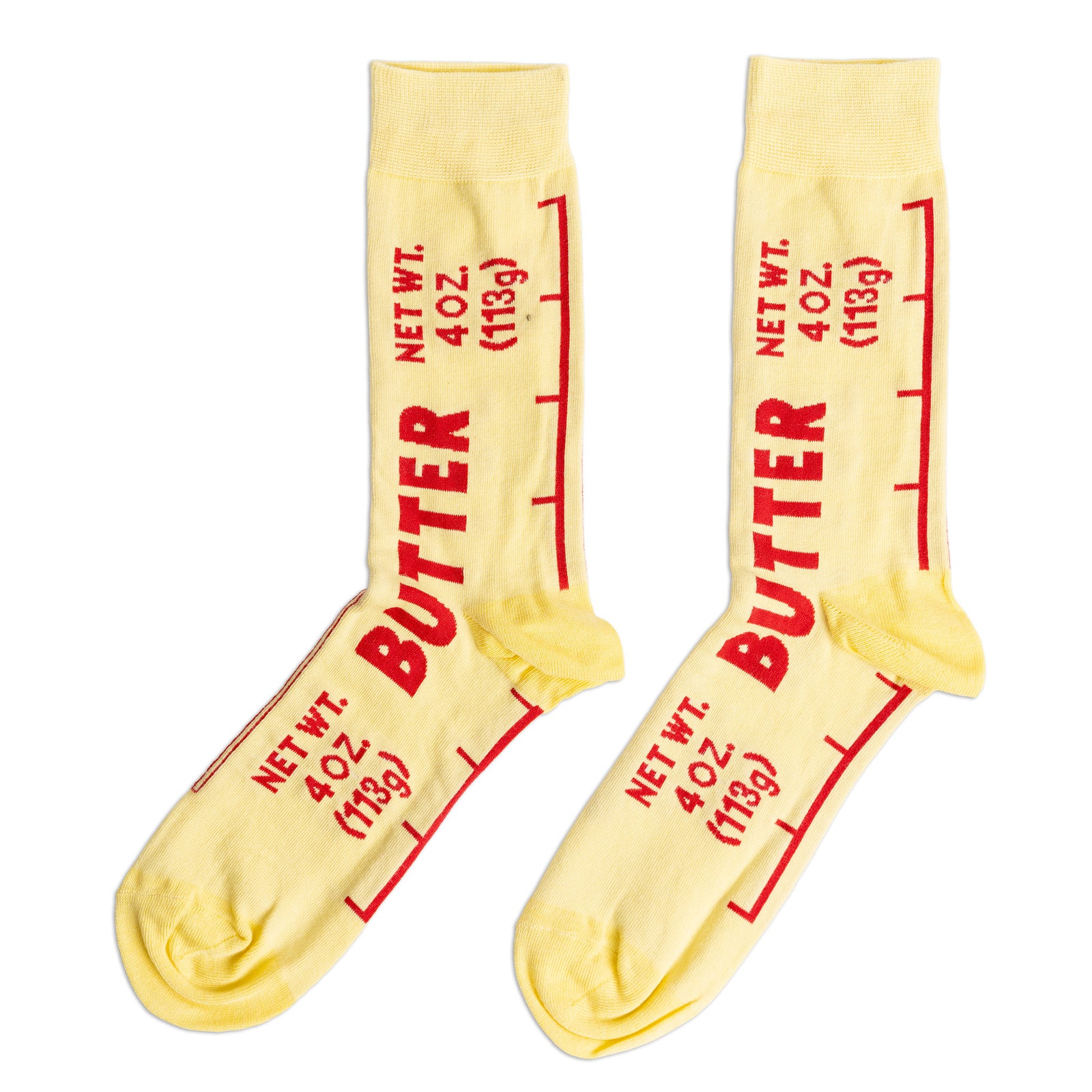 Yellow crew socks designed to look like a butter wrapper with bold red Butter label and Net Wt 4 oz text by Yellow Owl Workshop