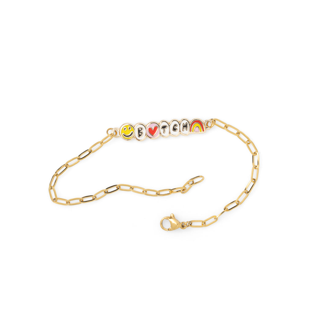 Gold paperclip chain Bitch bracelet with enamel letter charms and smiley face heart and rainbow unclasped on white background by Yellow Owl Workshop
