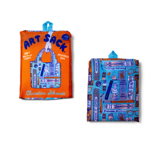 Bookbag Art Sack® folded front and back showing illustrated book print and red Art Sack® packaging by Yellow Owl Workshop