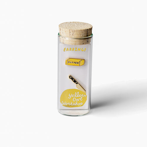 Butter and knife mismatched cloisonné stud earrings in glass vial packaging by Yellow Owl Workshop