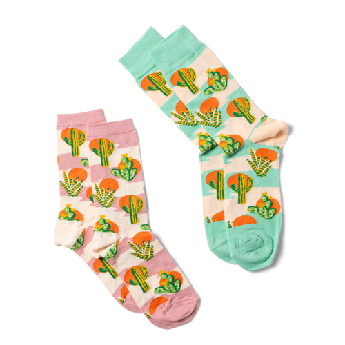 Cactus Sunset crew socks small and large sizes laid out side by side by Yellow Owl Workshop