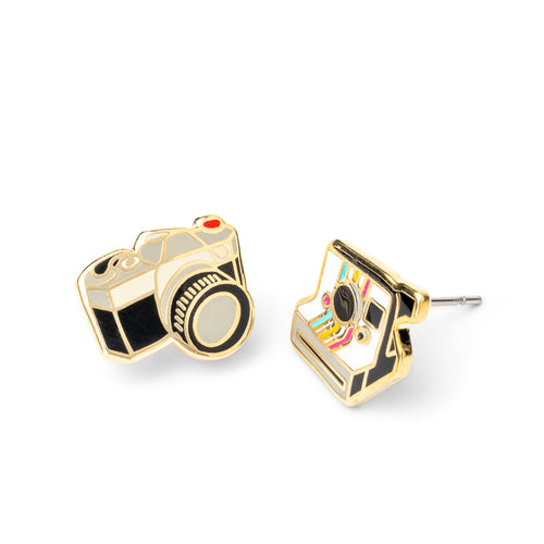 Mismatched cloisonné stud earrings featuring classic film camera and Polaroid instant camera gilded in 22 karat gold by Yellow Owl Workshop