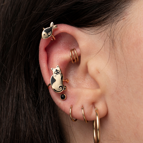 Gold cat and fish no-piercing ear cuffs worn on ear by Yellow Owl Workshop