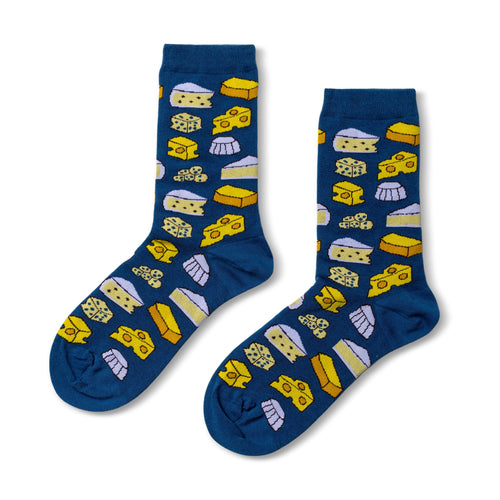 Blue crew socks featuring illustrated cheese varieties including brie gouda and swiss by Yellow Owl Workshop