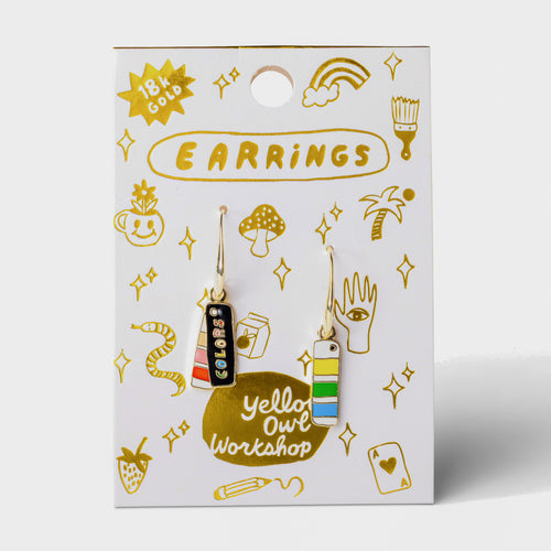 Colors Swatch Book mismatched enamel drop earrings on gold foil matchbook card by Yellow Owl Workshop