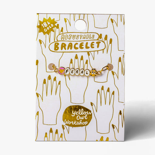 Enamel Feral letter charm bracelet on gold foil packaging card by Yellow Owl Workshop