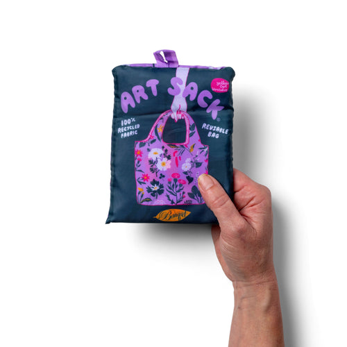 Person holding lavender illustrated botanical tote bag with whimsical floral print by Banquet Workshop for Yellow Owl Workshop