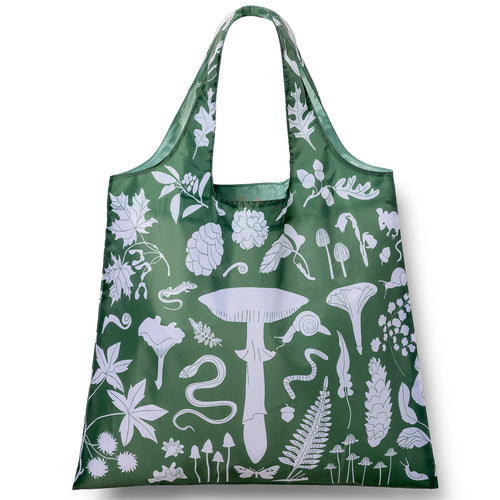 Green illustrated reusable tote bag with white monochromatic forest floor print featuring mushrooms ferns snakes and acorns by Banquet Workshop for Yellow Owl Workshop