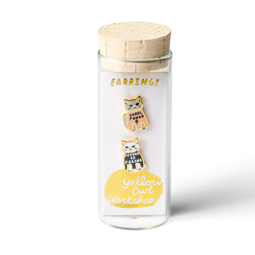 Gurrrl Power mismatched cloisonné cat stud earrings in glass vial packaging by Yellow Owl Workshop