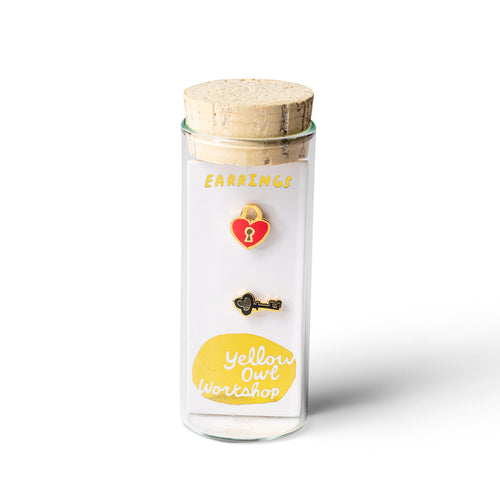 Heart lock and key mismatched cloisonné stud earrings in glass vial packaging by Yellow Owl Workshop