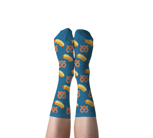Blue Hot Dog and Pretzel crew socks with illustrated stadium snacks worn on feet by Yellow Owl Workshop