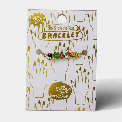 Lucky Charms enamel bracelet on gold foil packaging card by Yellow Owl Workshop