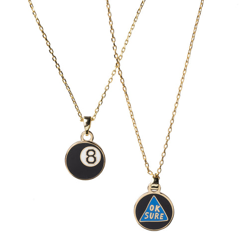 Double-sided enamel pendant necklace showing magic 8-ball side and Ok Sure blue triangle side on 18k gold chain by Yellow Owl Workshop