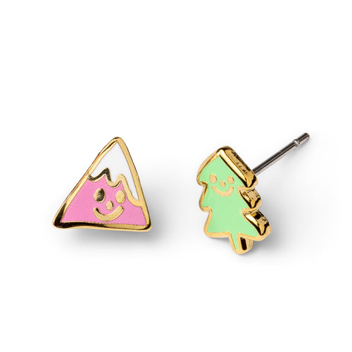 Mismatched cloisonné stud earrings featuring smiley pink mountain and green tree gilded in 22 karat gold by Yellow Owl Workshop