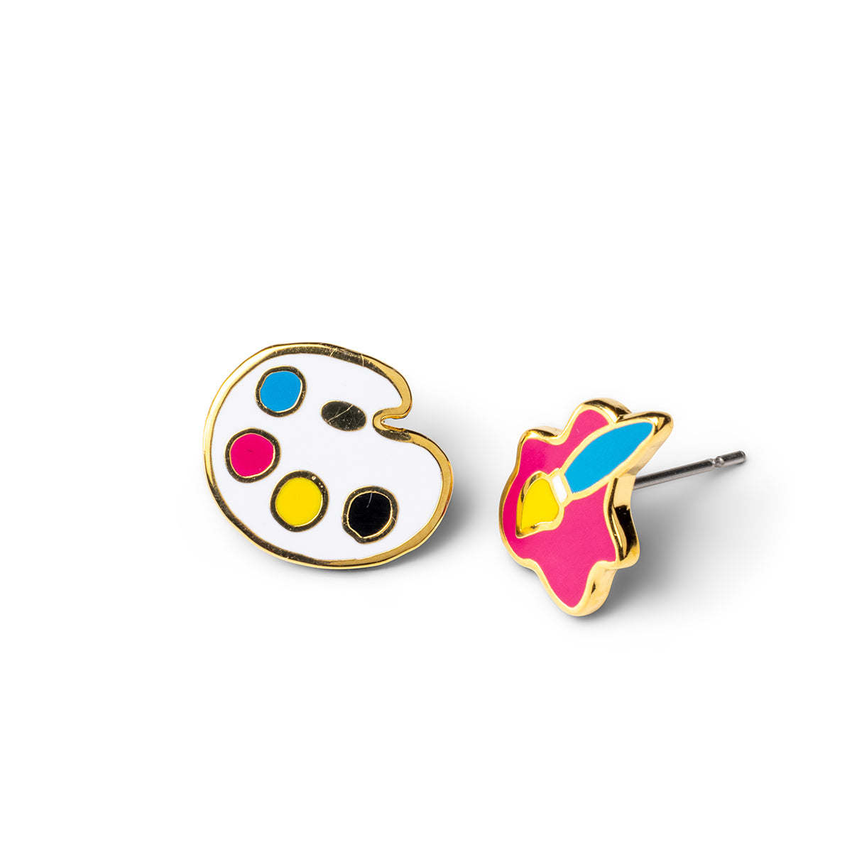 Mismatched gold stud earrings featuring white paint palette with cyan magenta yellow and black wells and hot pink paint splash with paintbrush by Yellow Owl Workshop