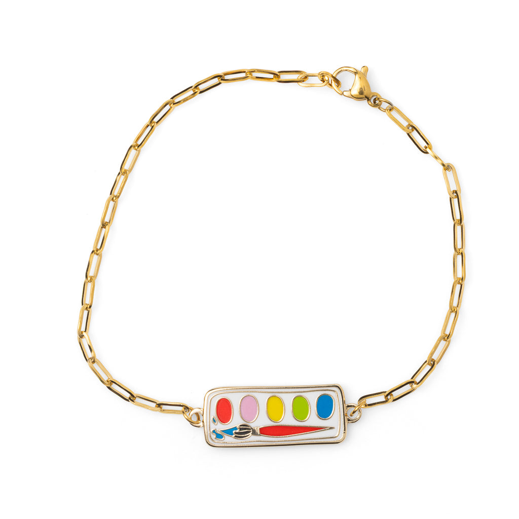 Colorful enamel watercolor paint set charm bracelet with red pink yellow green and blue wells and paintbrush on gold paperclip chain by Yellow Owl Workshop