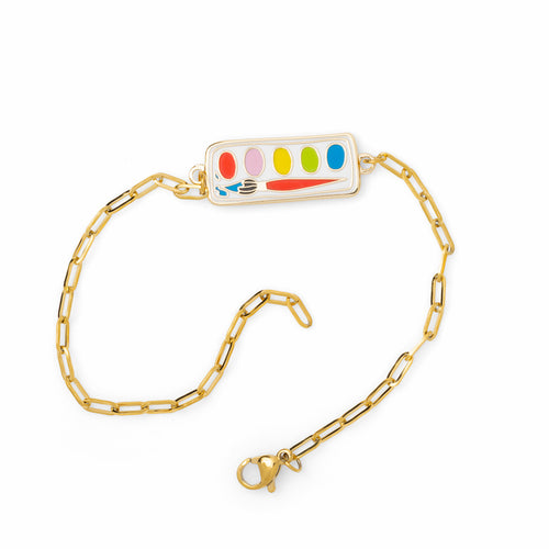 Colorful enamel paint set charm bracelet unclasped on white background by Yellow Owl Workshop