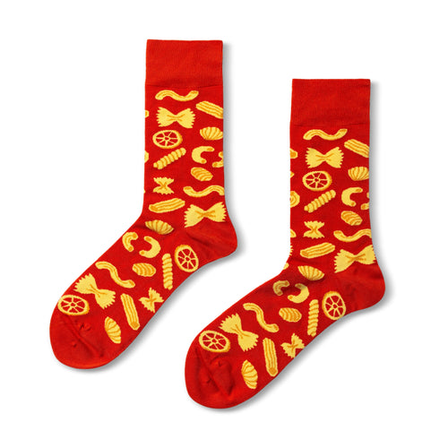 Red crew socks featuring illustrated pasta shapes including farfalle fusilli and rigatoni by Yellow Owl Workshop