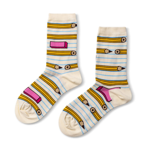 Cream crew socks featuring illustrated yellow pencils and pink eraser on blue notebook paper stripe background by Yellow Owl Workshop