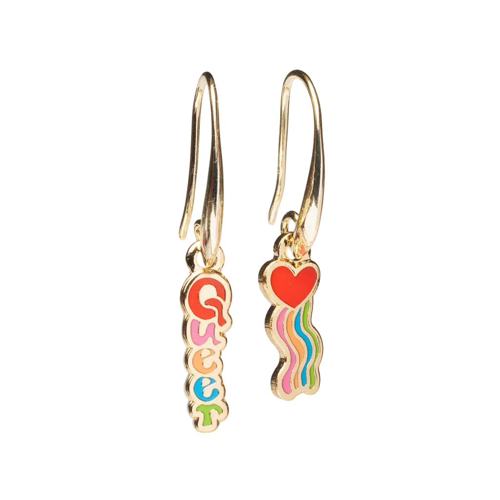 Mismatched enamel drop earrings featuring Queer in multicolor stacked letters and red heart with rainbow stripes by Yellow Owl Workshop