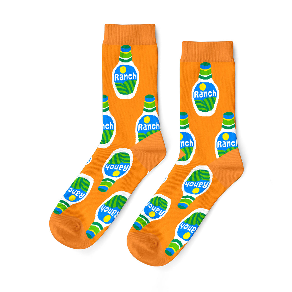 Orange crew socks featuring illustrated ranch dressing bottles in green blue and white by Yellow Owl Workshop