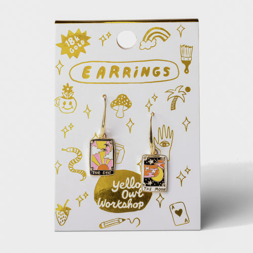 Sun and Moon Tarot mismatched enamel drop earrings on gold foil matchbook card by Yellow Owl Workshop