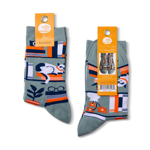 Two pairs of socks with bookshelf patterns on a white background