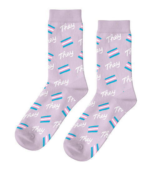 Lavender crew socks featuring They script and trans flag stripes in pink white and blue by Yellow Owl Workshop