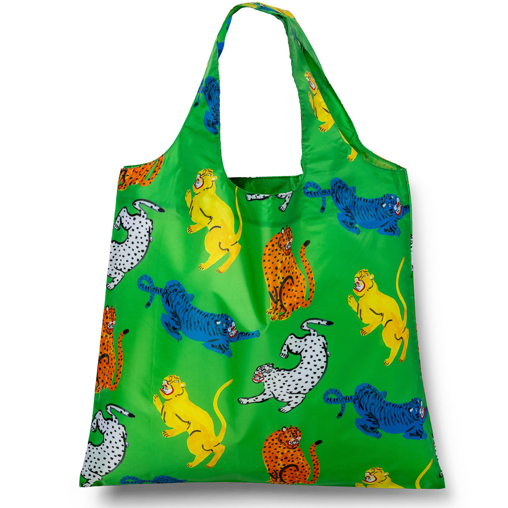 Green illustrated reusable tote bag with colorful wildcat print including tigers and leopards by Kristina Micotti for Yellow Owl Workshop