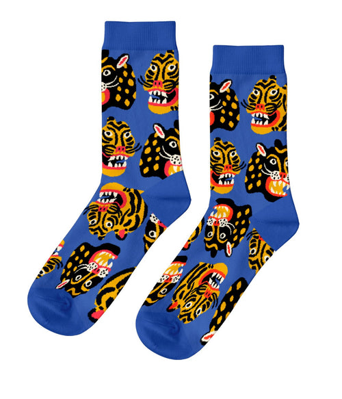 Cobalt blue crew socks featuring bold graphic wildcat face illustrations by Kristina Micotti for Yellow Owl Workshop