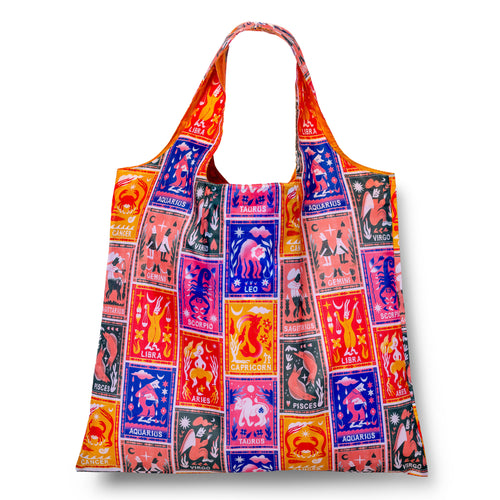 Illustrated reusable tote bag covered in colorful zodiac symbols for all twelve signs by Roisin O'Donnell for Yellow Owl Workshop