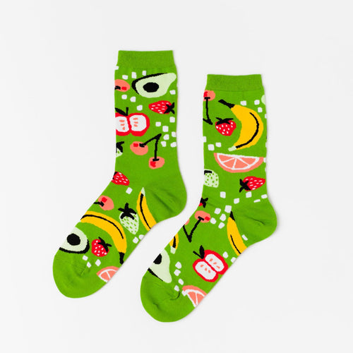 Bright green crew socks featuring illustrated avocado banana strawberry cherries apple and grapefruit by Yellow Owl Workshop