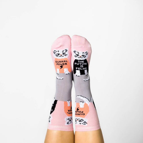 Pink and grey Future is Feline crew socks with cat print worn on feet by Yellow Owl Workshop